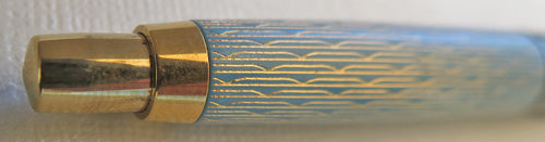 PARKER JOTTER PRINCESS IN LIGHT BLUE WITH GOLD WAVE PATTERN ON CAP AND DARK GREY BARREL