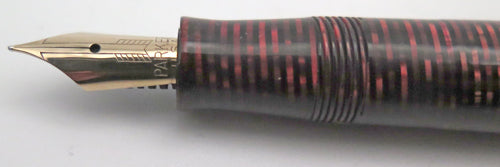 "George S. Parker VACUUM FILLER" FOUNTAIN PEN IN LAMINATED BURGUNDY.